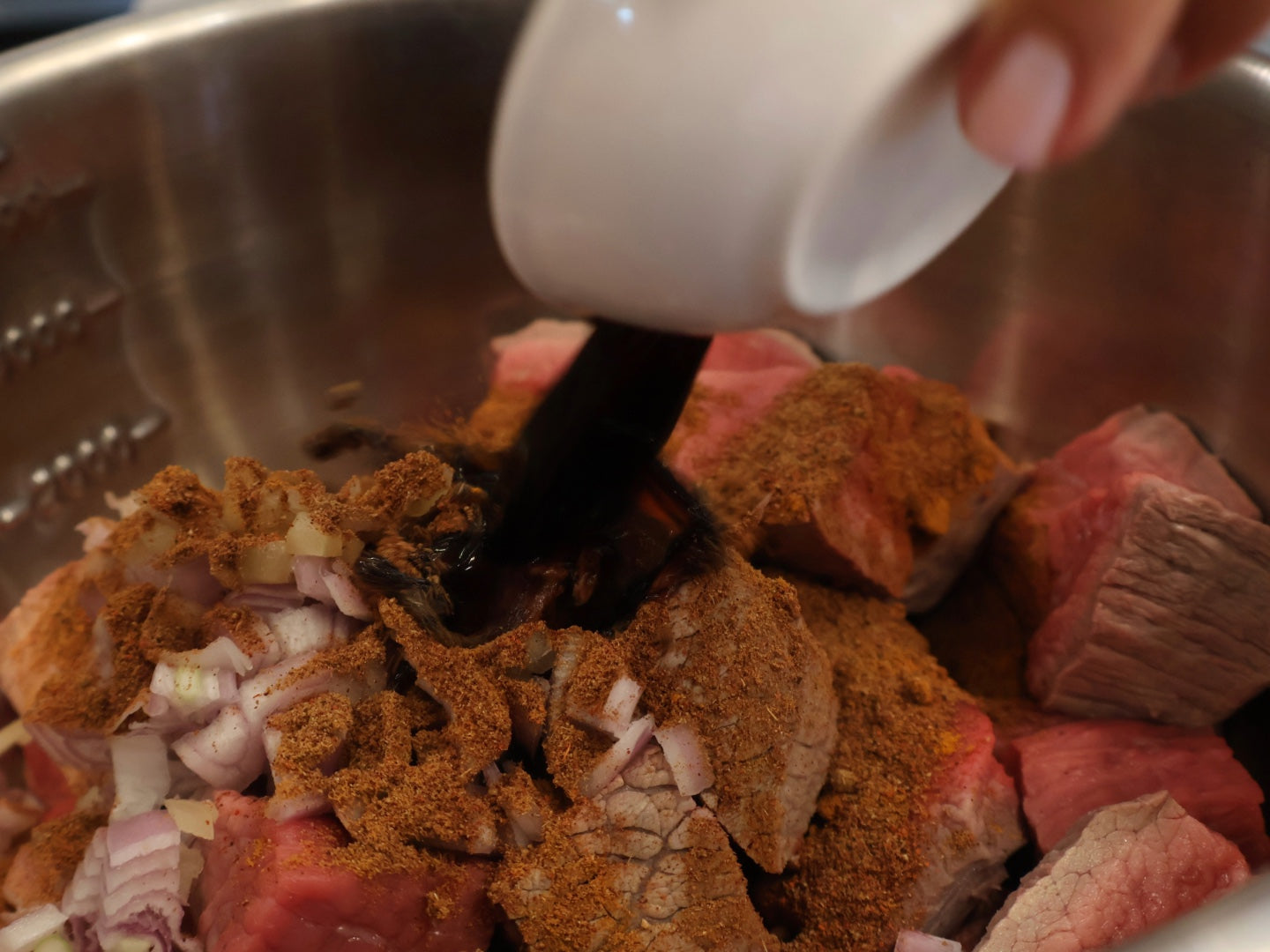 Bò kho Vietnamese beef stew in a deep red aromatic broth