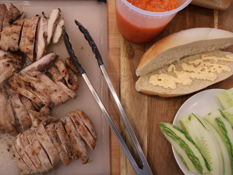 Grilled protein prepared for a banh mi sandwich