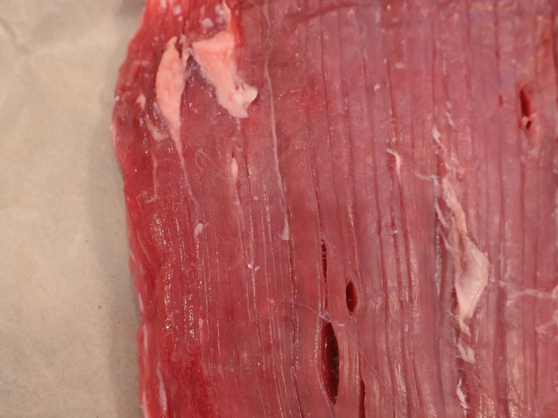 Carne asada sliced thin against the grain
