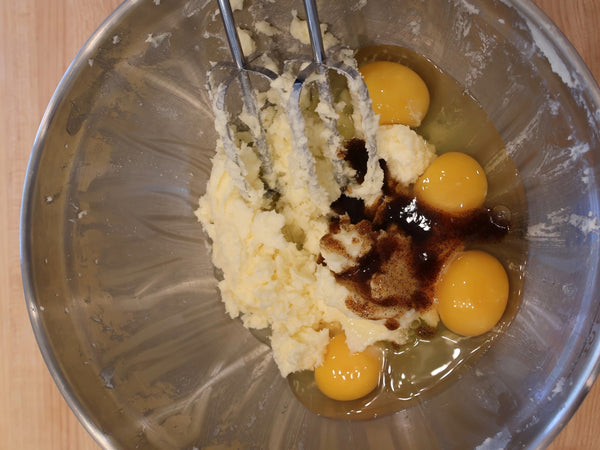 Beat in eggs and vanilla extract
