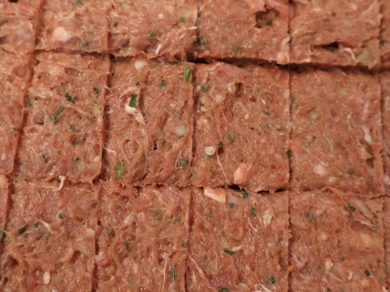 Flatbreads, kebab meat, sauces, and toppings arranged for a build-your-own meal