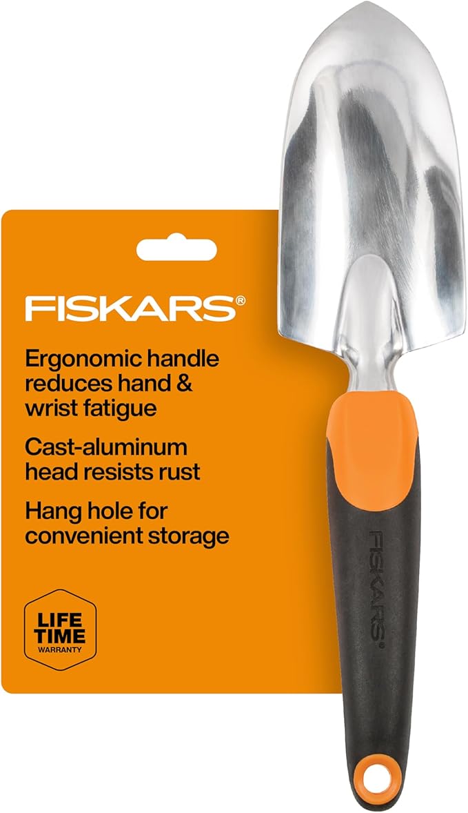 Fiskars garden trowel with orange handle and black grip on a white background