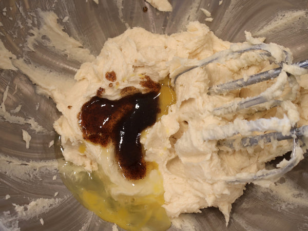 Beat in the eggs and vanilla
