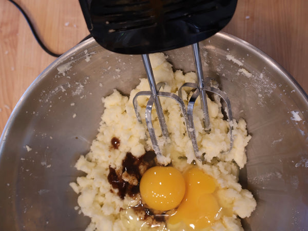 Mix in the eggs and vanilla